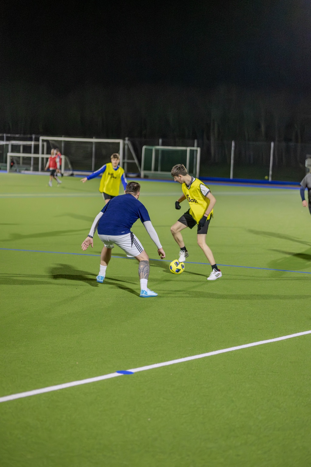 One-on-one duel between players at an All About Football game